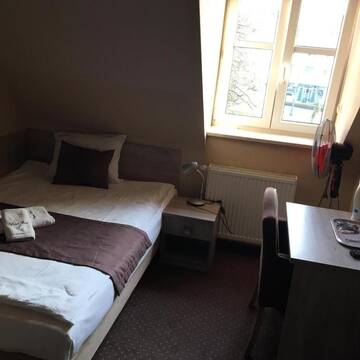 Фото номера Стандартный одноместный номер Отель Hotel Piast w centrum г. Мальборк 7
