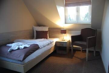 Фото номера Стандартный одноместный номер Отель Hotel Piast w centrum г. Мальборк 9
