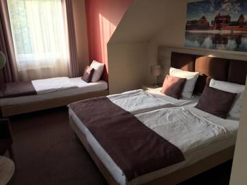Фото номера Семейный номер Делюкс Отель Hotel Piast w centrum г. Мальборк 4