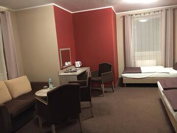 Фото номера Семейный номер Делюкс Отель Hotel Piast w centrum г. Мальборк 3