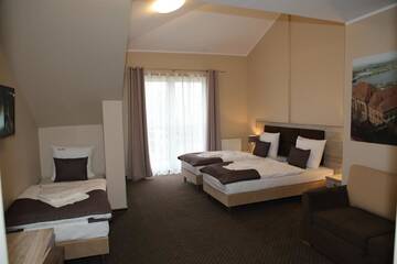 Фото номера Семейный номер с балконом Отель Hotel Piast w centrum г. Мальборк 5